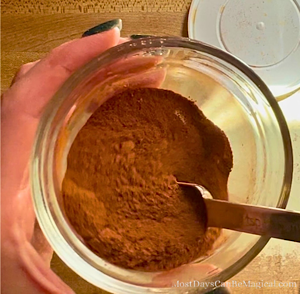 A small glass bowl containing a 5-ingredient pumpkin pie spice mix.