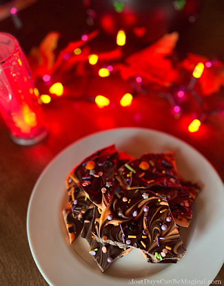 Disney-Inspired Swirled Halloween Bark with Mickey-shaped Halloween sprinkles.