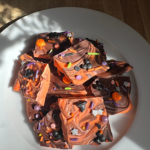 Disney-Inspired Swirled Halloween Bark with Mickey-shaped Halloween sprinkles.