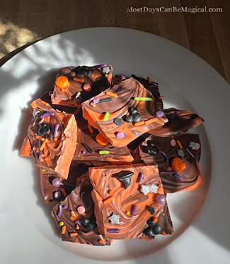 Disney-Inspired Swirled Halloween Bark with Mickey-shaped Halloween sprinkles.